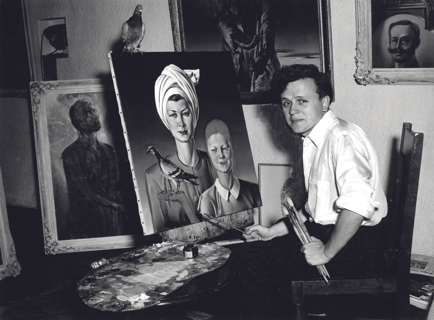 Tretchikoff with famous pigeon Schkoora, perched on his painting